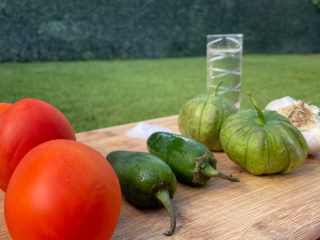 red and gree tomatoes, serranos, salt and tequila